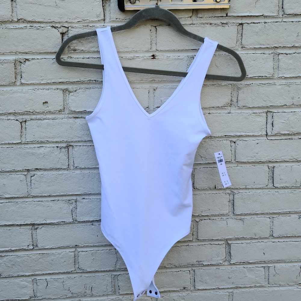 NWT White V-Neck Bodysuit